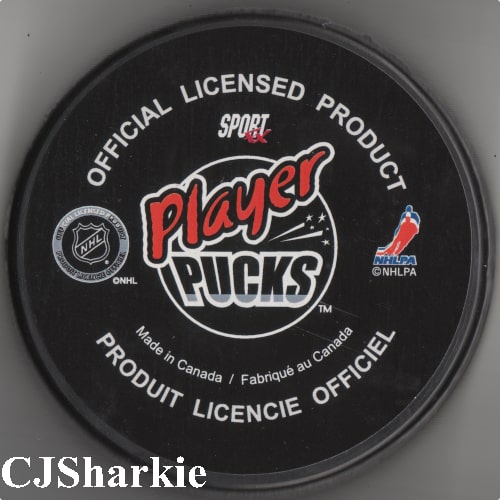 Mike Grier Puck back view