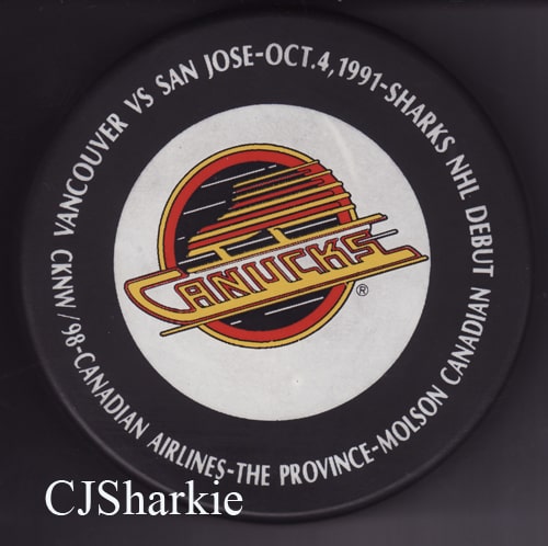 Commemorative 1st Regular Season Game Puck back view